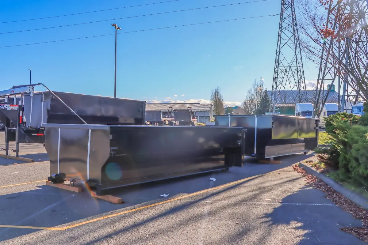 Roll-off dumpster ready for waste disposal at job site for Yard Waste Dumpster Rental in Franklin